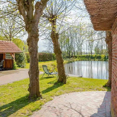 Reetdach Ostfriesenhaus Casa de Férias Südbrookmerland