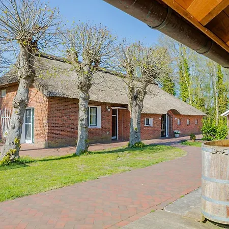 Reetdach Ostfriesenhaus Casa de Férias Südbrookmerland